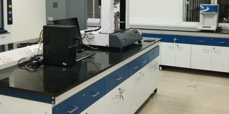 Advanced industrial laboratory interior with workstations and equipment – chemical lab furniture and design project